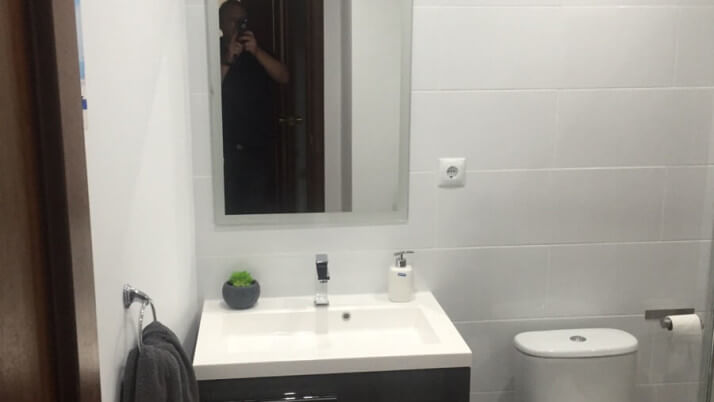 bathroom remodeled sink mirror toilet marbella homes
